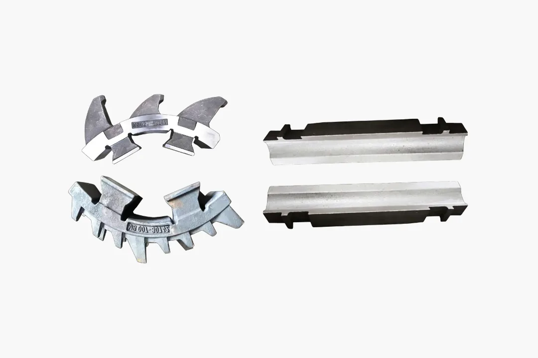 Cement clinker crusher wear parts made from bainitic steel and high-chrome cast iron for hammer mill and clinker crushing applications.