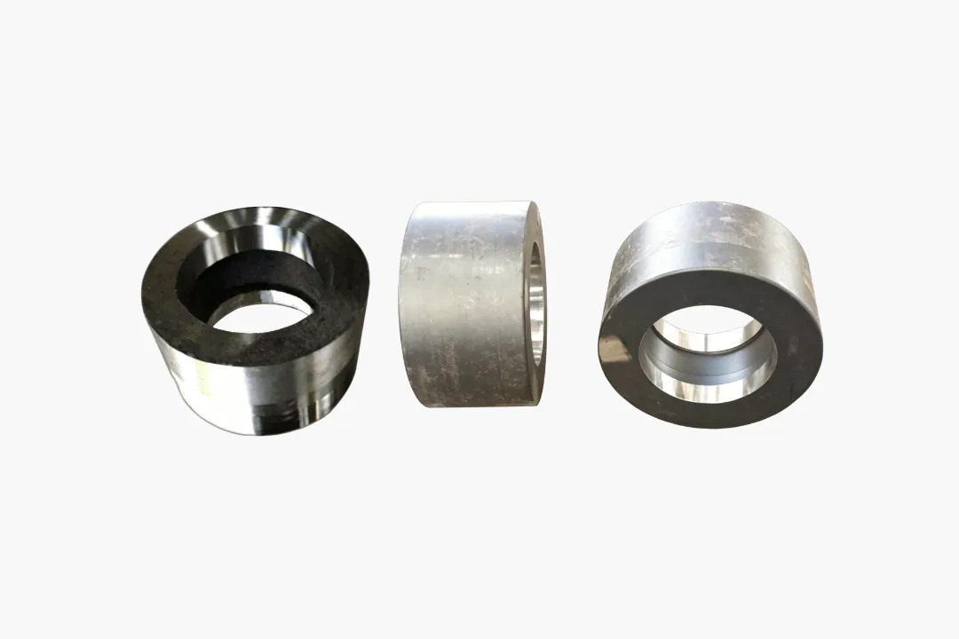 Bainitic steel grinding roller for vertical mill and Raymond mill applications in cement production.