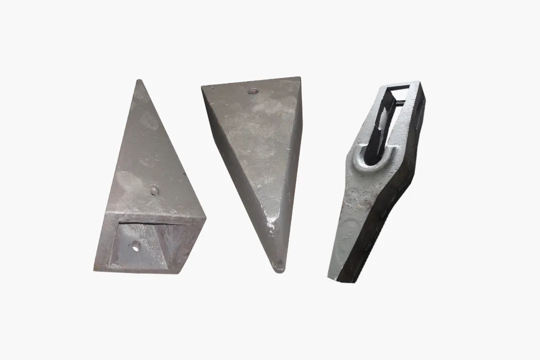 Bainitic steel grab and clamshell teeth for dredging applications, designed for hard-bottom impact and abrasive wear.