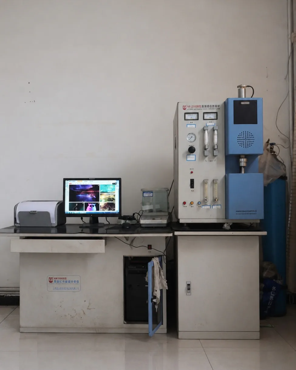 Carbon-sulphur analyser for precise C/S content determination in cast steel quality control.